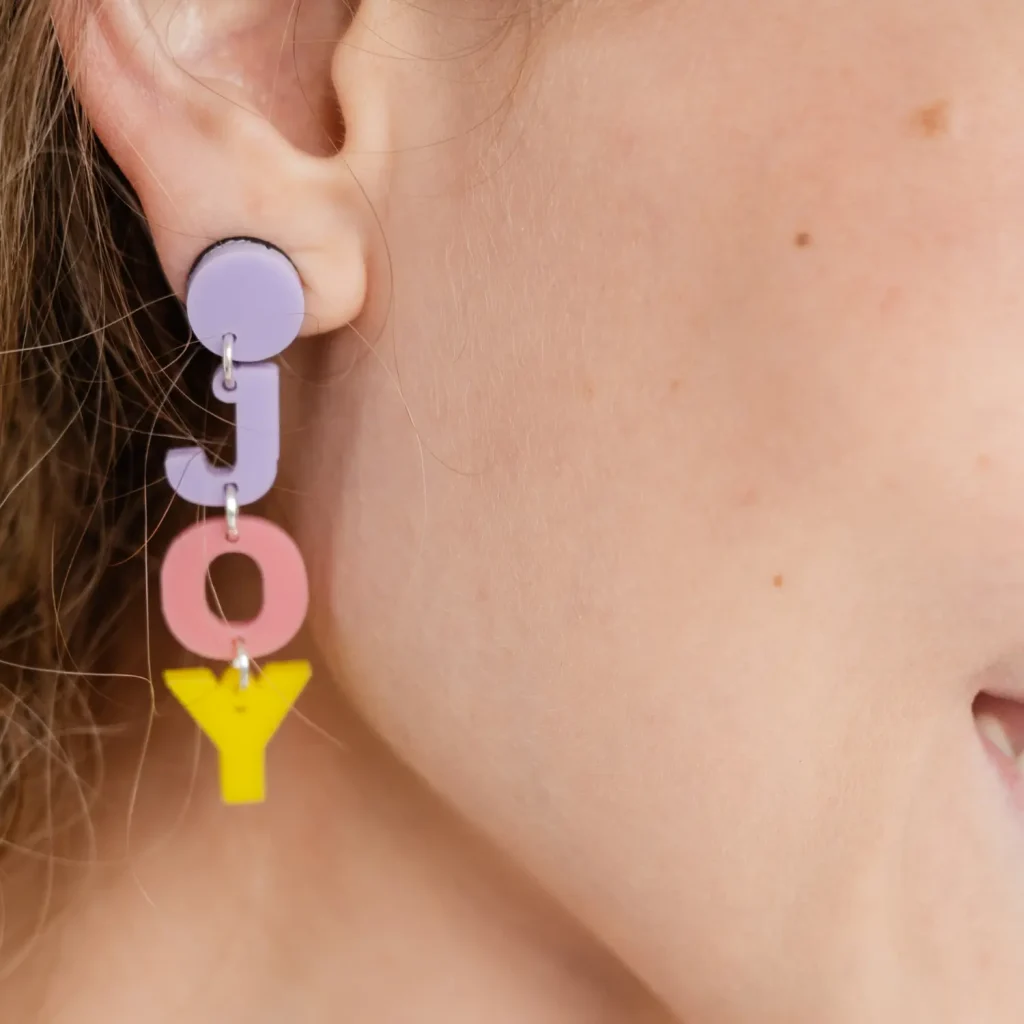 lady happy with ear wax removal